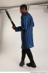 Garson STANDING POSE WITH KATANA AND SHOTGUN